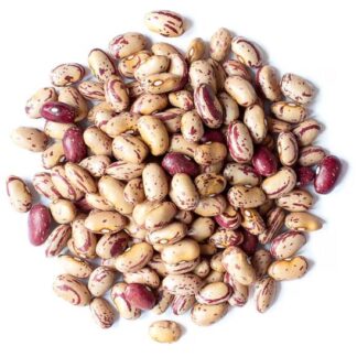 A large pile of bulk SunRidge Farms Organic Cranberry Beans, displaying their signature cream-colored skins with dark red speckles.